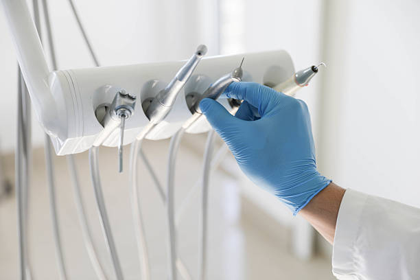 Professional Tooth Extraction technician working in Hornsby Bend, TX